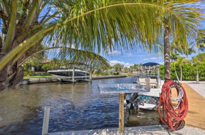 Palm City Canalfront Home with Tiki Hut and Dock!